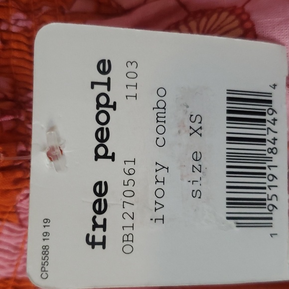 Free People Miss Daisy Floral Print top. Garment is labeled M. Attached says XS. - Picture 6 of 9